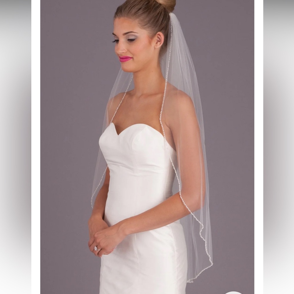 Kennedy blue Reese veil (worn just for ceremony)